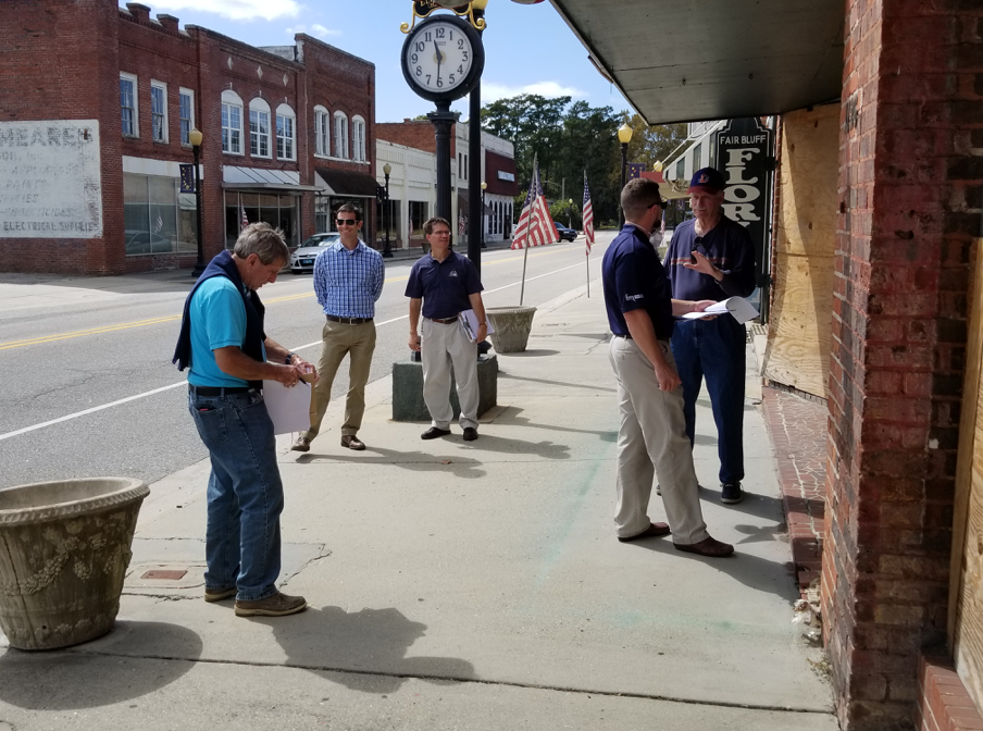 Coordinating with experts with the Association of State Flood Plain Managers (ASFPM) and the State’s Historic Preservation Office, HMDRRI staff visit with leadership from the Town of Fair Bluff during a workshop to identify potential flood retrofit recommendations for the historic downtown. Photo by Gavin Smith.