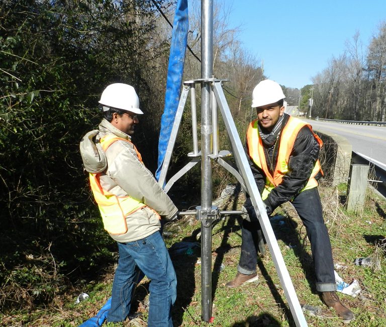 Mohammad Kayser, left, and Yulian Kebede, students of Dr. Gabr at North Carolina State University funded by the Coastal Resilience Center, test the in-situ erosion evaluation probe. Photo submitted.