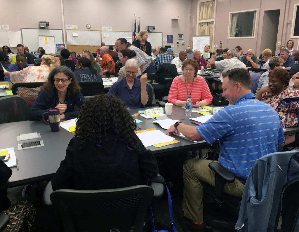 Participants in “A Project Management Framework for HM Disaster Functions,” a training course delivered by the University of Maryland, work through group assessment activities. Photo by Don Bouchard.