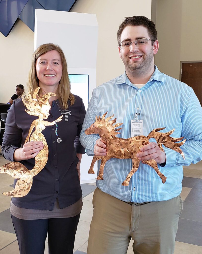 From left: ADCIRC Community Woman of the Year Ashley Kauppila of Taylor Engineering and ADCIRC Community Man of the year Taylor Asher of the University of North Carolina at Chapel Hill. Photo by Josh Kastrinsky.